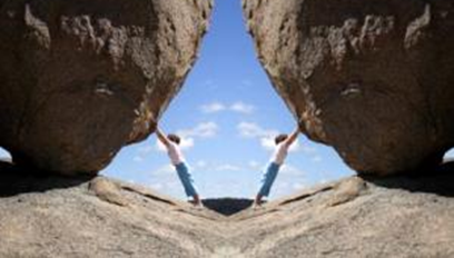 Two Boulders Being Pushed : Two Monumental Tasks